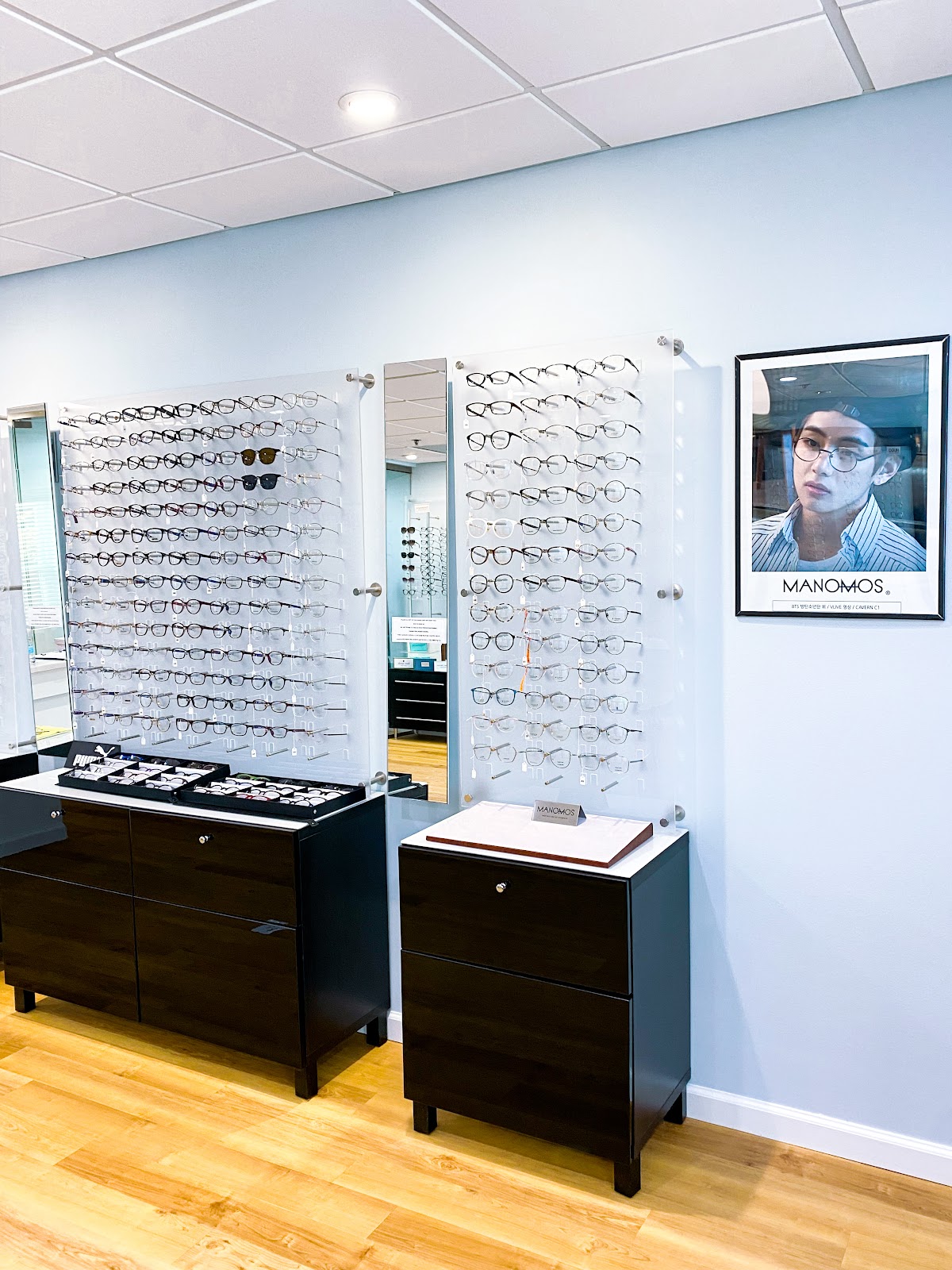 Optical frame display area with wood floors